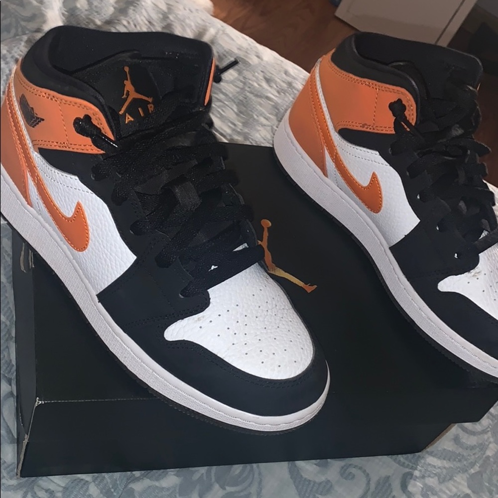 Air Jordan 1 mids orange color way